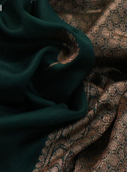 Banarasi organza saree dark green with woven buttas and banarasi style border