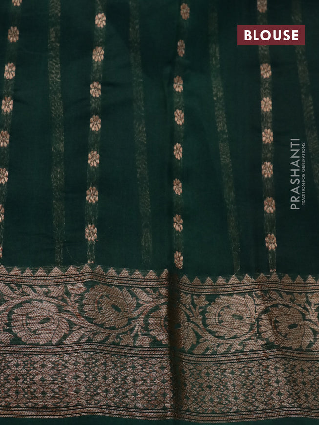 Banarasi organza saree dark green with woven buttas and banarasi style border