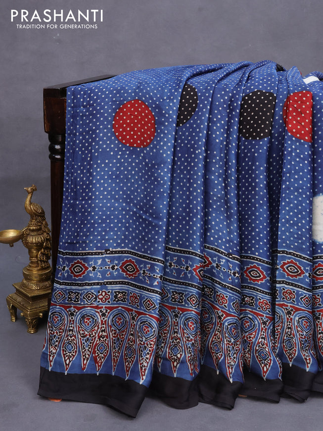 Modal silk saree blue and black with allover polka dot prints and ajrakh printed pallu