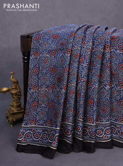 Modal silk saree blue and black with allover ajrakh prints and printed border