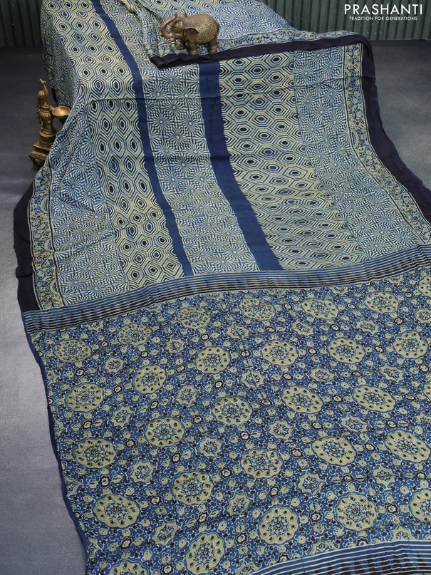 Modal silk saree peacock blue and black with allover ajrakh prints and printed border