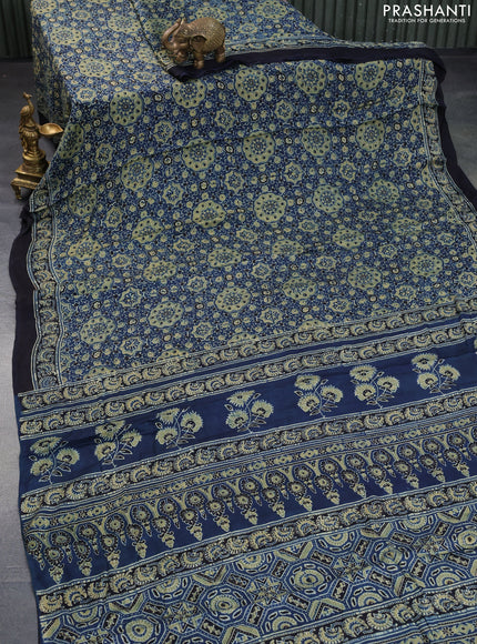 Modal silk saree peacock blue and black with allover ajrakh prints and printed border