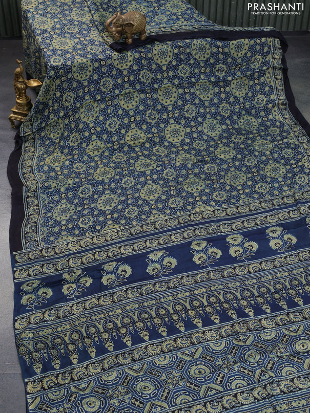 Modal silk saree peacock blue and black with allover ajrakh prints and printed border