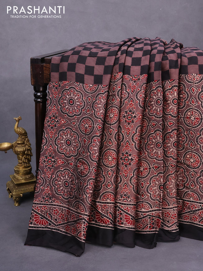 Modal silk saree brown and black with allover ajrakh prints and printed border