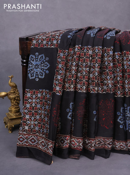 Modal silk saree black with allover ajrakh prints and printed border