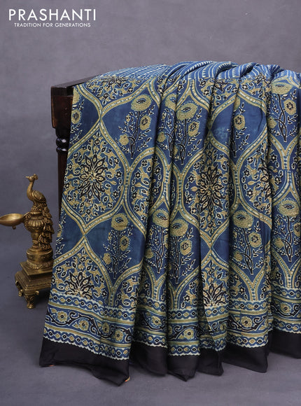 Modal silk saree blue and black with allover ajrakh prints and printed border