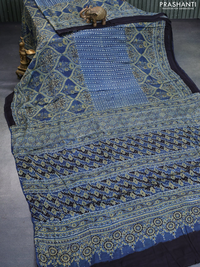 Modal silk saree blue and black with allover ajrakh prints and printed border