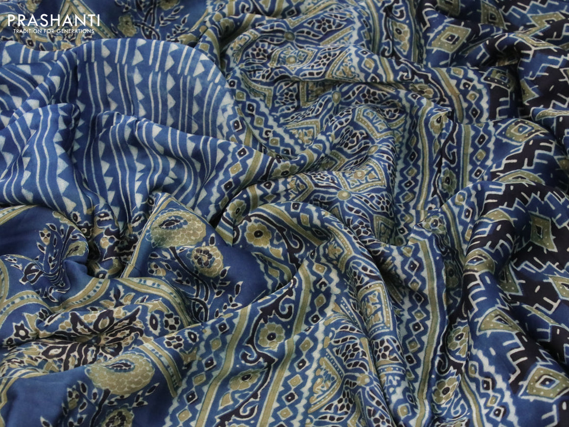 Modal silk saree blue and black with allover ajrakh prints and printed border