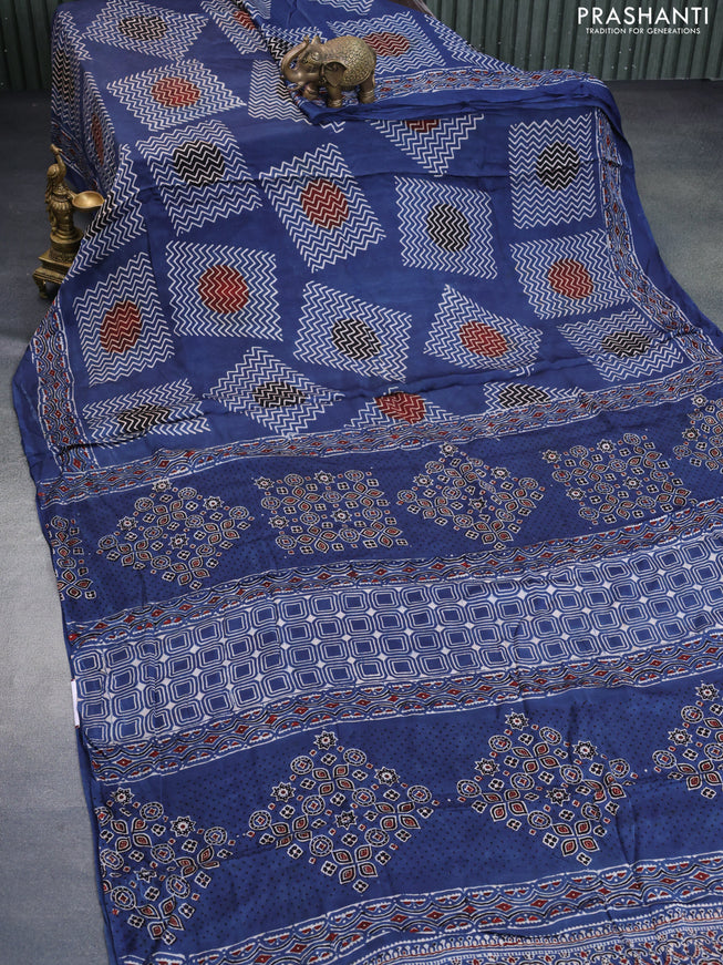 Modal silk saree indigo blue with allover ajrakh prints and printed border