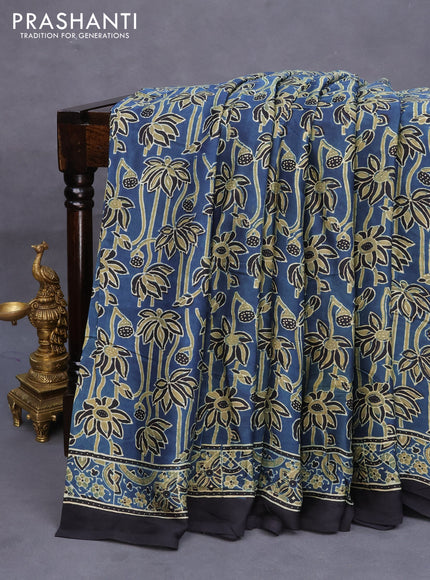 Modal silk saree peacock blue and black with allover ajrakh prints in borderless style