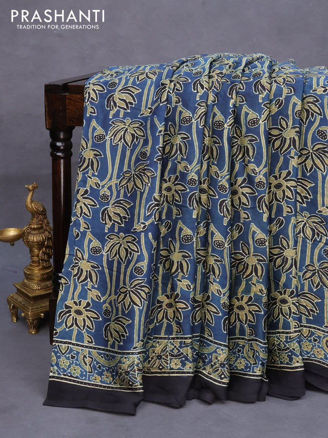 Modal silk saree peacock blue and black with allover ajrakh prints in borderless style