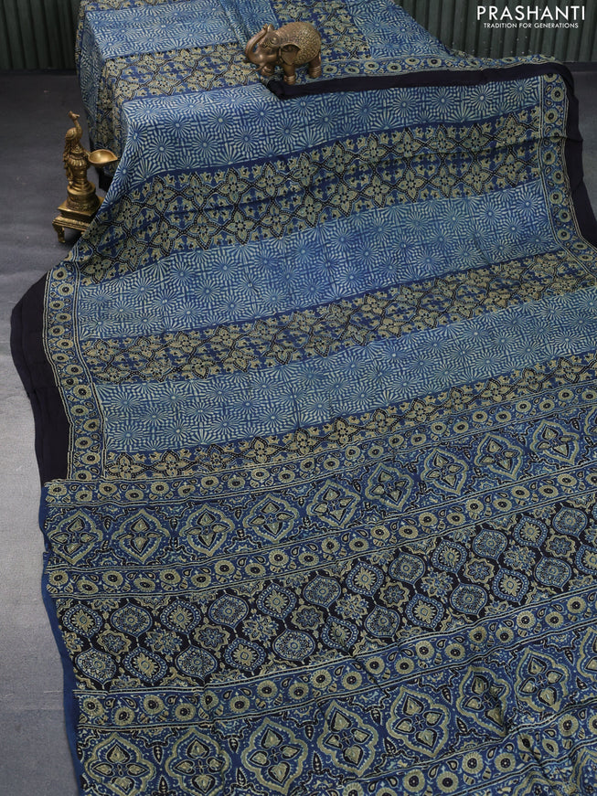 Modal silk saree peacock blue and black with allover ajrakh prints and printed border