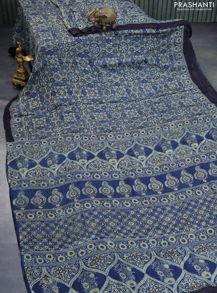 Modal silk saree peacock blue with allover ajrakh prints and printed border