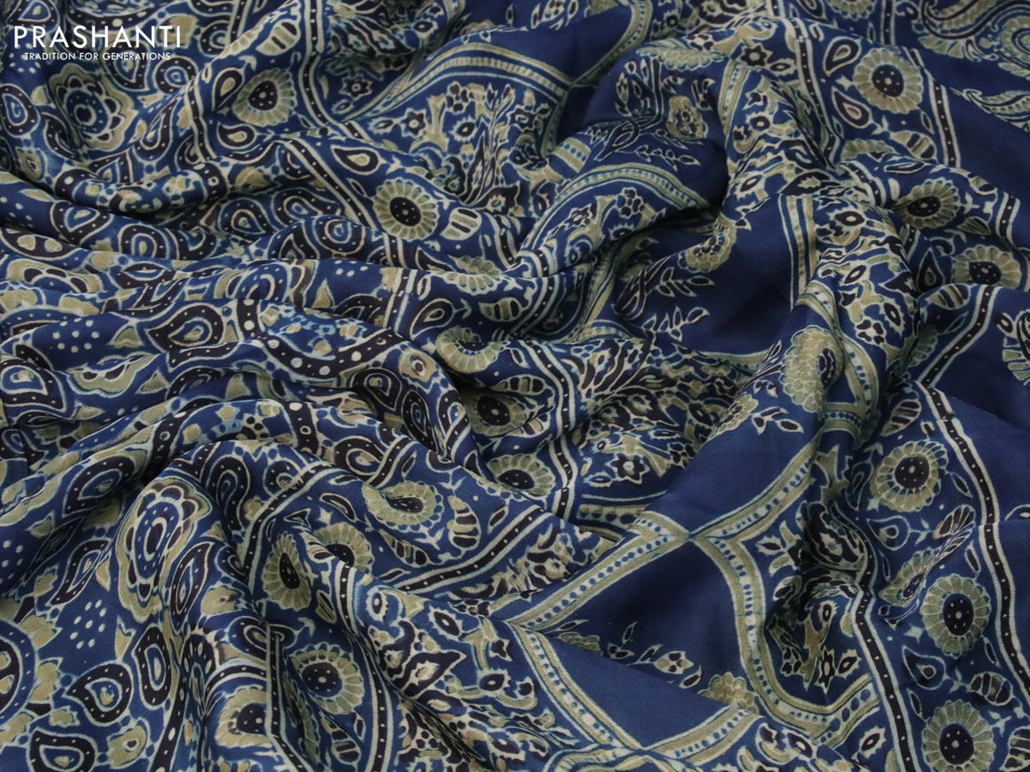 Modal silk saree peacock blue with allover ajrakh prints and printed border