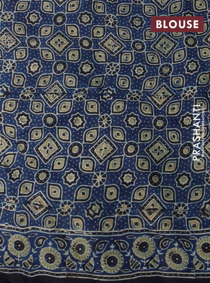 Modal silk saree peacock blue with allover ajrakh prints and printed border