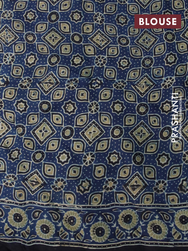 Modal silk saree peacock blue with allover ajrakh prints and printed border