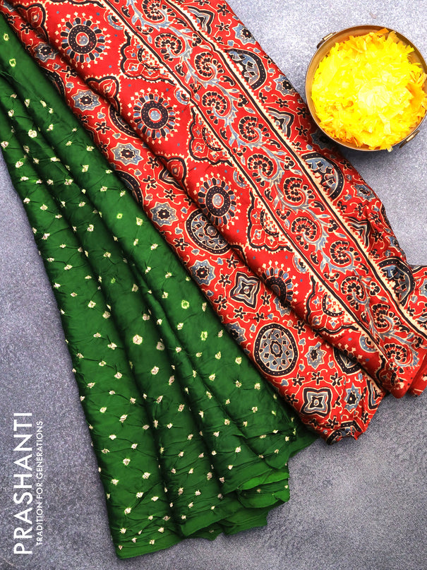 Modal silk saree green and rustic maroon with allover bandhani prints and ajrakh printed pallu