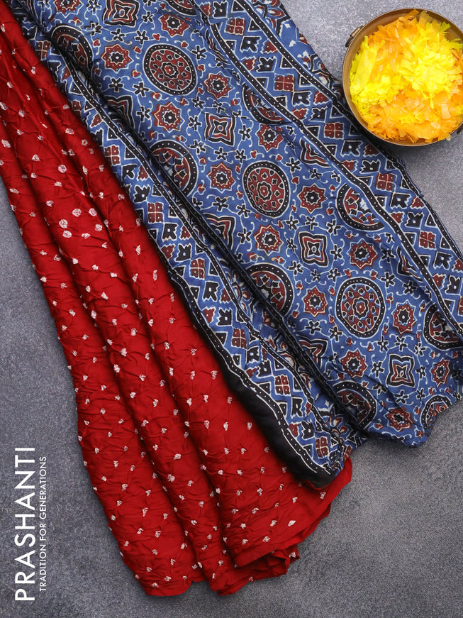 Modal silk saree red and blue with allover bandhani prints and ajrakh printed pallu