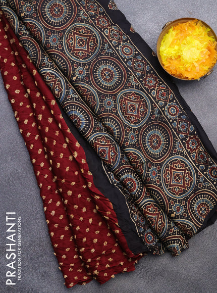 Modal silk saree deep maroon and black with allover bandhani prints and ajrakh printed pallu