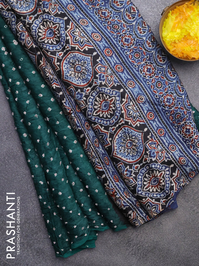 Modal silk saree peacock green and indigo blue with allover bandhani prints and ajrakh printed pallu