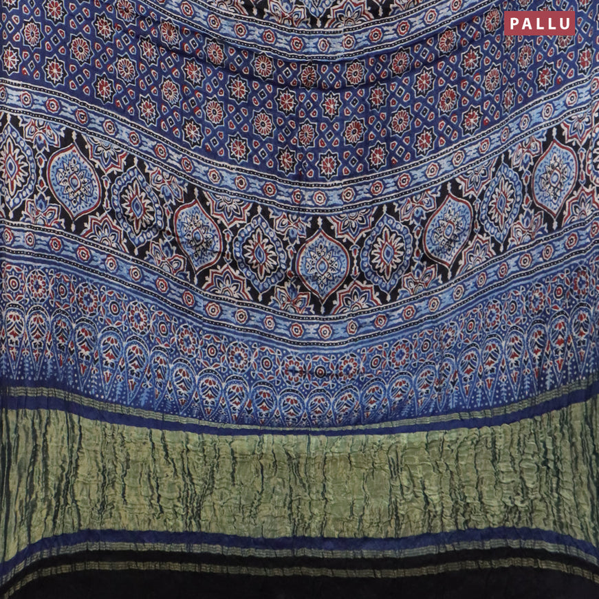 Modal silk saree peacock green and indigo blue with allover bandhani prints and ajrakh printed pallu