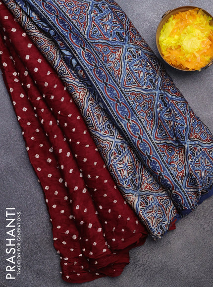 Modal silk saree deep maroon and indigo blue with allover bandhani prints and ajrakh printed pallu