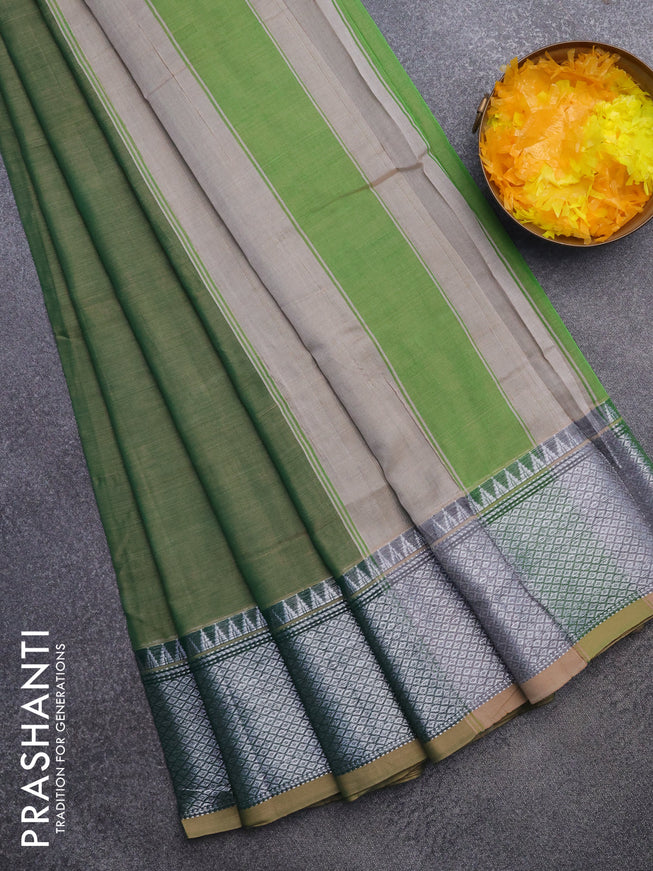 Narayanpet cotton saree green shade with plain body and silver zari woven border