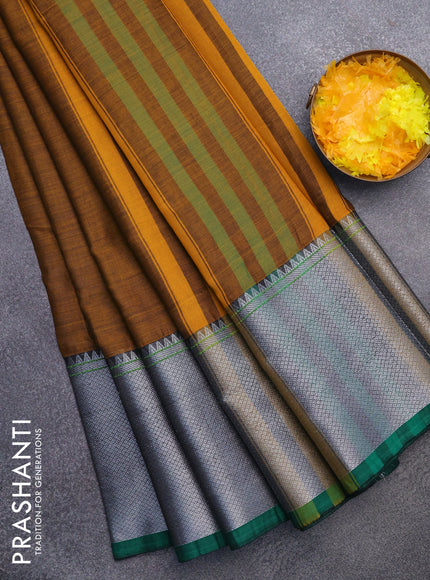 Narayanpet cotton saree mustard yellow and green with plain body and silver zari woven border