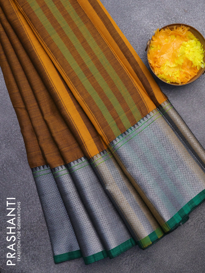 Narayanpet cotton saree mustard yellow and green with plain body and silver zari woven border