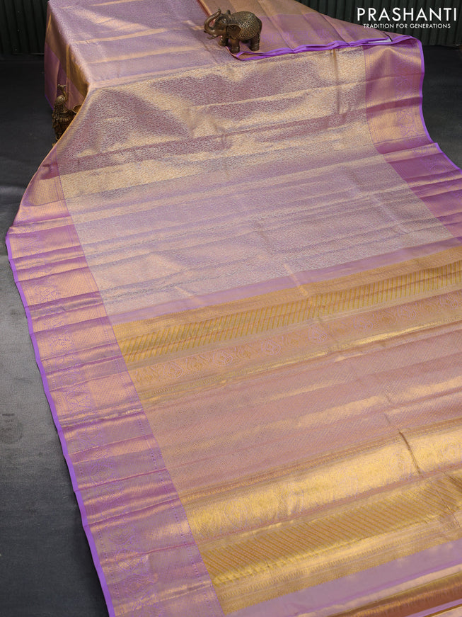 Pure kanchipuram tissue silk saree dual shade of gold and lavender with allover silver zari woven brocade weaves and zari woven border