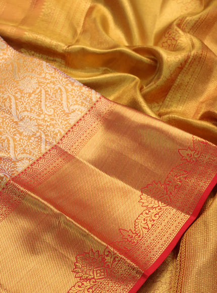 Pure kanchipuram tissue silk saree dual shade of gold and red with allover silver zari woven brocade weaves and long zari woven border