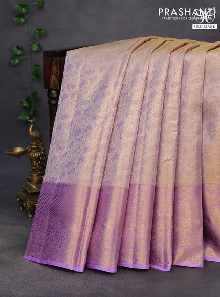 Pure kanchipuram tissue silk saree dual shade of gold and lavender shade with allover silver zari woven brocade weaves and long zari woven border