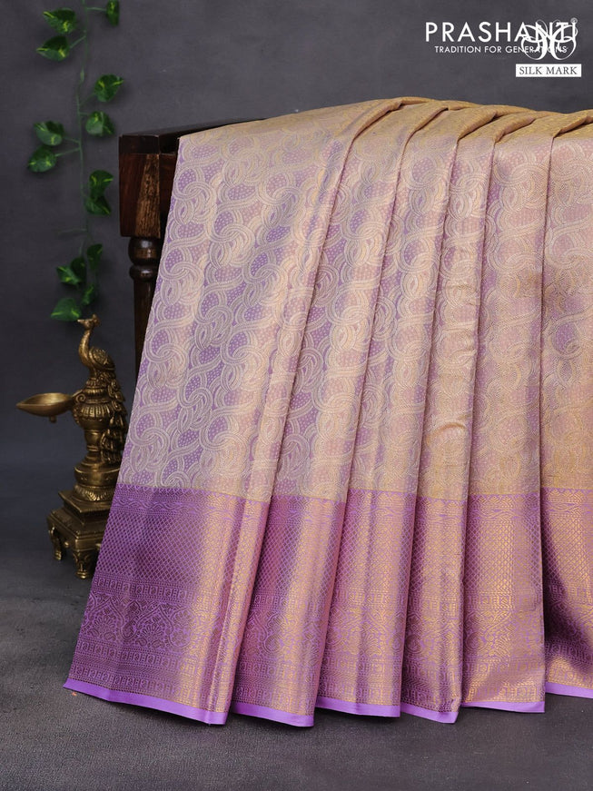 Pure kanchipuram tissue silk saree dual shade of gold and lavender shade with allover silver zari woven brocade weaves and long zari woven border