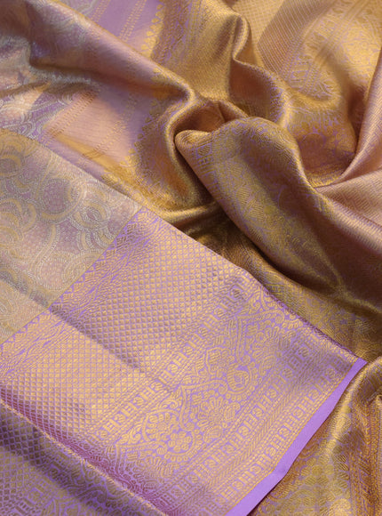 Pure kanchipuram tissue silk saree dual shade of gold and lavender shade with allover silver zari woven brocade weaves and long zari woven border