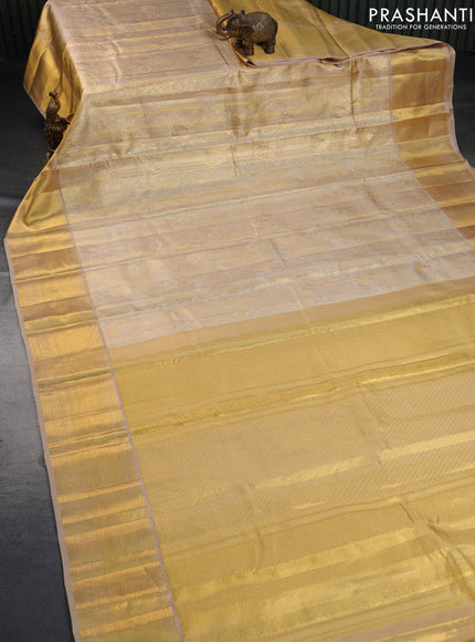 Pure kanchipuram tissue silk saree dual shade of gold and beige with allover zari woven brocade weaves and zari woven border