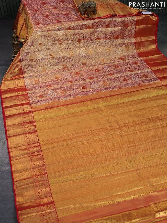 Pure kanchipuram tissue silk saree dual shade of gold and red with allover silver zari woven brocade weaves and rich zari woven border