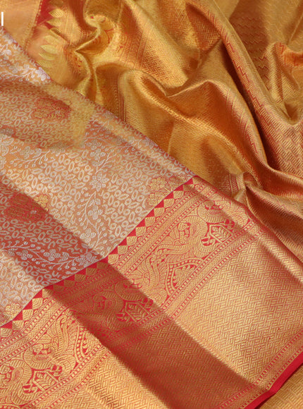 Pure kanchipuram tissue silk saree dual shade of gold and red with allover silver zari woven brocade weaves and rich zari woven border