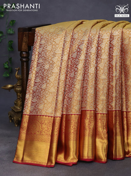 Pure kanchipuram tissue silk saree gold and maroon with allover silver zari woven brocade weaves and rich zari woven border