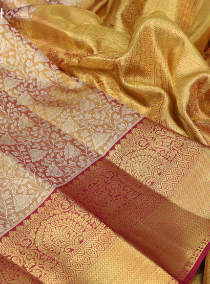 Pure kanchipuram tissue silk saree gold and maroon with allover silver zari woven brocade weaves and rich zari woven border