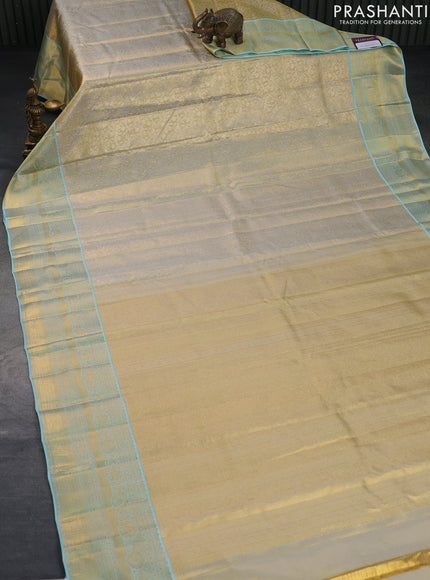 Pure kanchipuram tissue silk saree gold and light blue with allover silver zari woven brocade weaves and long rich zari woven border