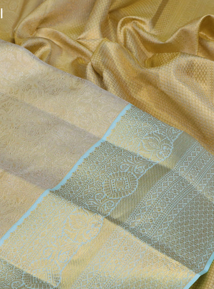 Pure kanchipuram tissue silk saree gold and light blue with allover silver zari woven brocade weaves and long rich zari woven border