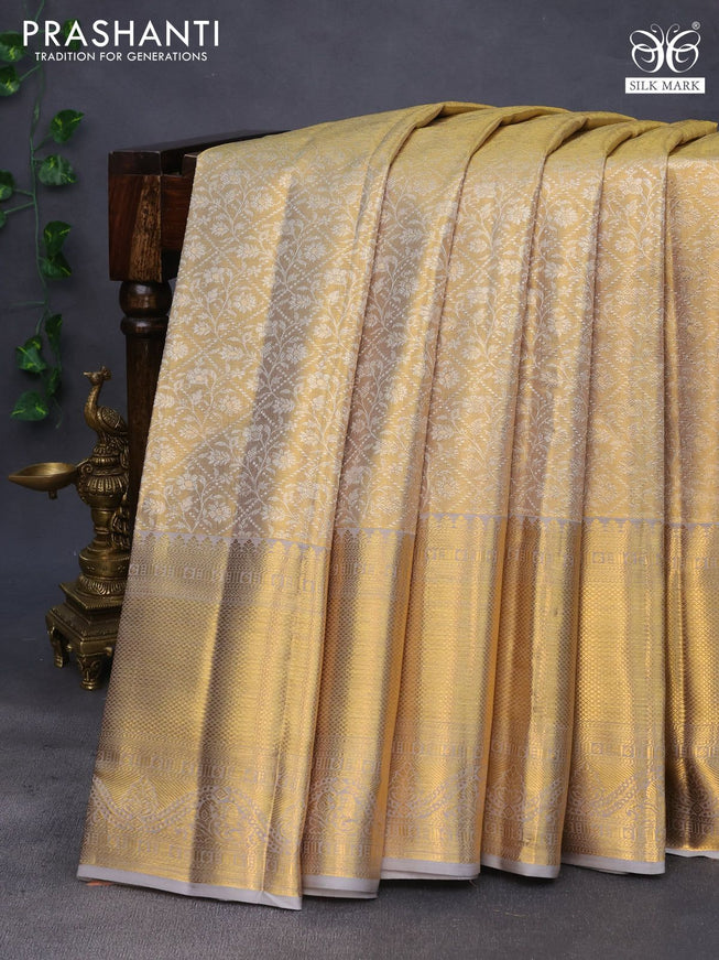 Pure kanchipuram tissue silk saree gold and grey with allover silver zari woven brocade weaves and long rich zari woven border