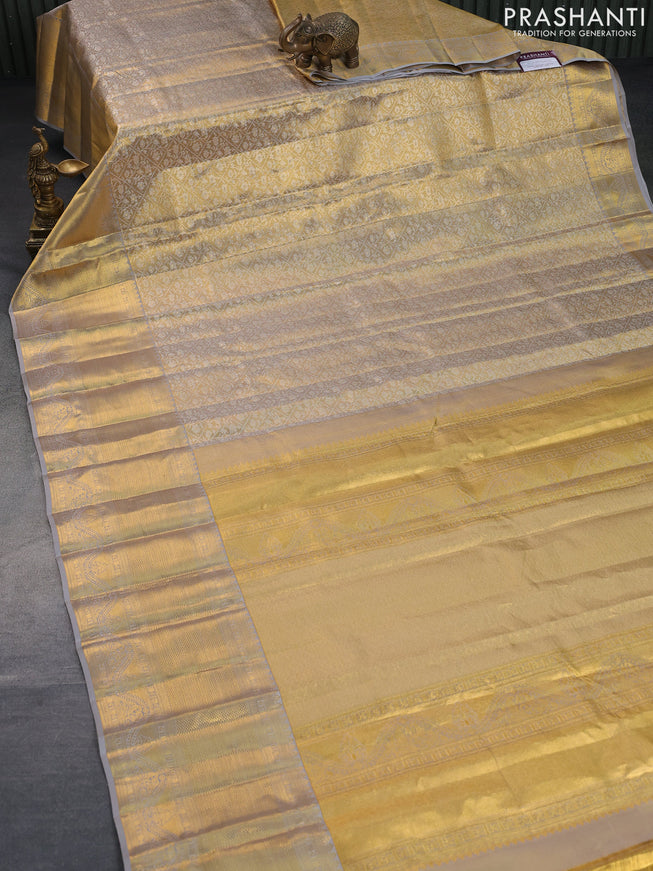 Pure kanchipuram tissue silk saree gold and grey with allover silver zari woven brocade weaves and long rich zari woven border