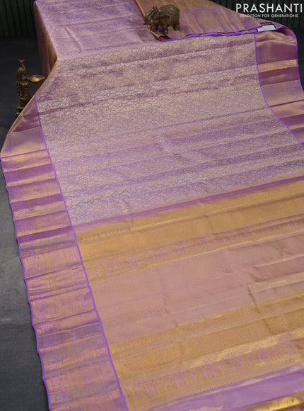 Pure kanchipuram tissue silk saree mild lavender and lavender with allover silver zari woven brocade weaves and long rich zari woven border