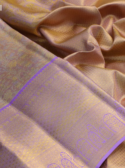 Pure kanchipuram tissue silk saree mild lavender and lavender with allover silver zari woven brocade weaves and long rich zari woven border