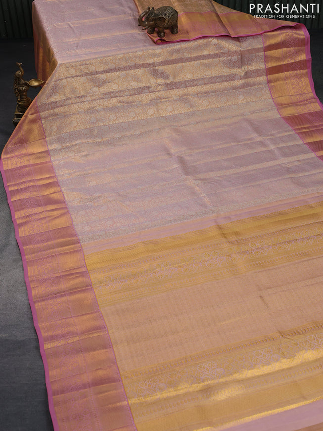 Pure kanchipuram tissue silk saree pastel peach and peach pink with allover silver zari woven brocade weaves and long rich zari woven border