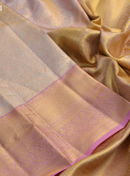 Pure kanchipuram tissue silk saree pastel peach and peach pink with allover silver zari woven brocade weaves and long rich zari woven border