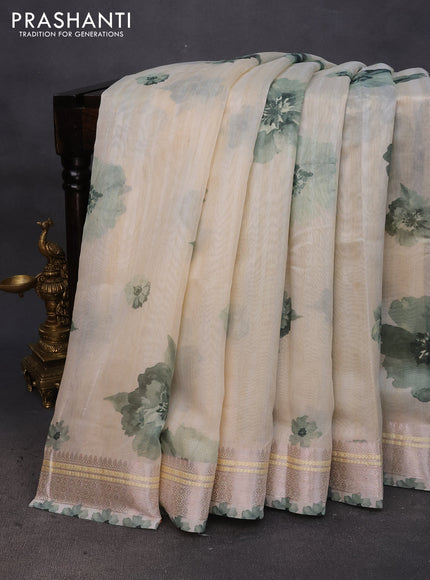 Semi tussar saree cream and pastel green with allover floral digital prints and zari woven border