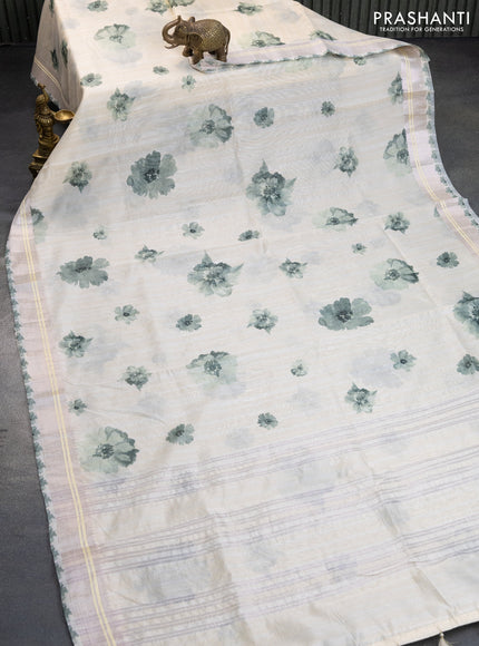 Semi tussar saree cream and pastel green with allover floral digital prints and zari woven border