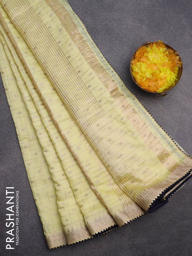 Semi chanderi saree pale yellow and dark blue with allover zari checks & buttas and zari woven & gotapatti lace work border